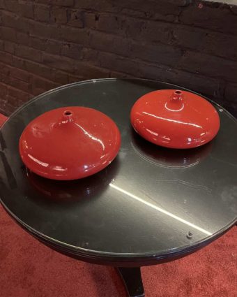 Pair of red lacquered ceramic vases