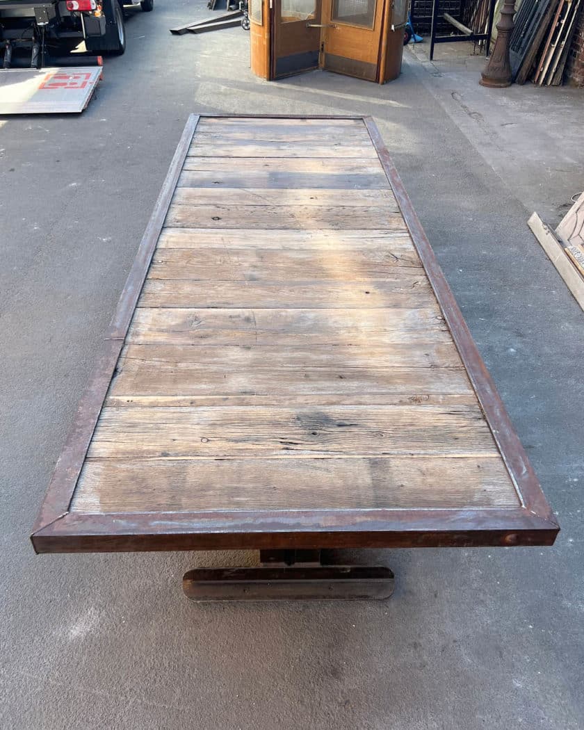 Table with oak top and cast-iron base