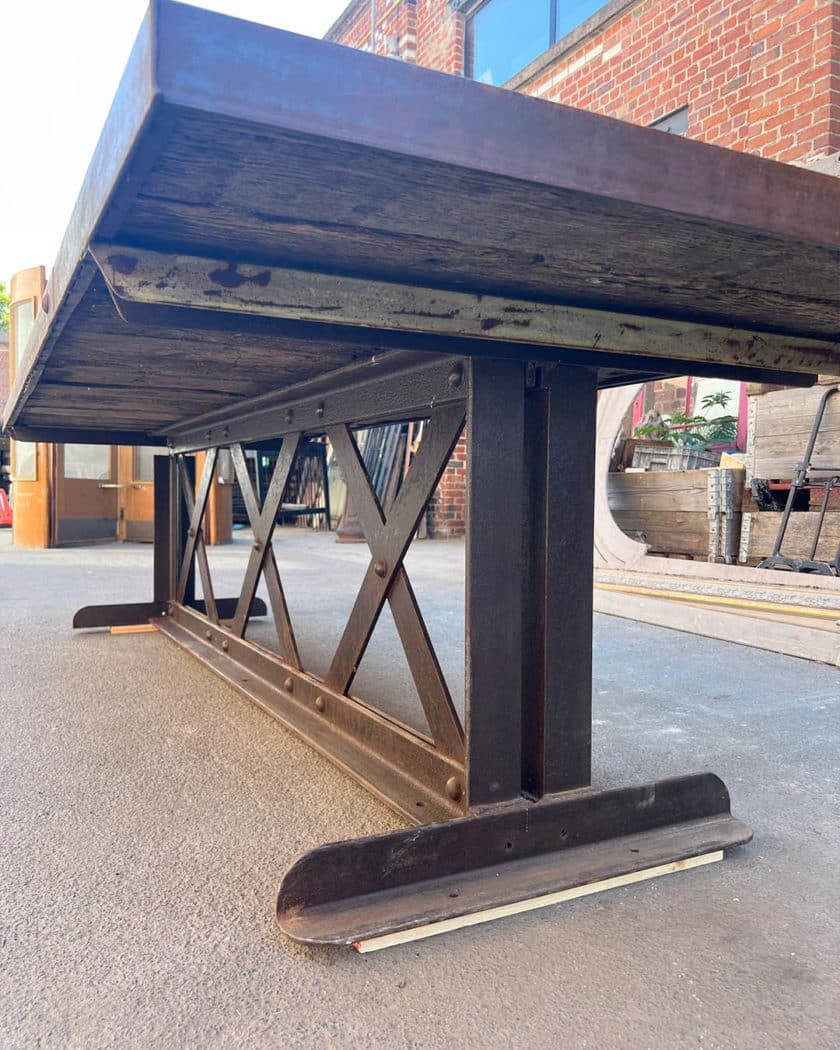 Table with oak top and cast-iron base