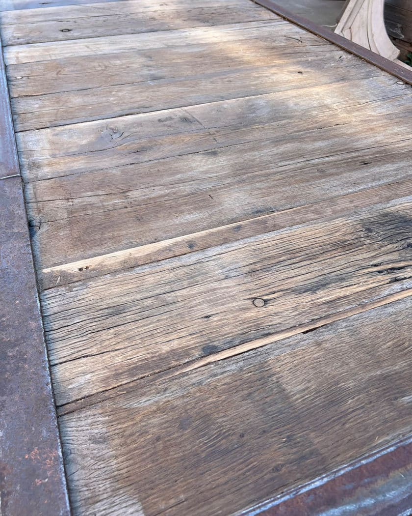 Table with oak top and cast-iron base