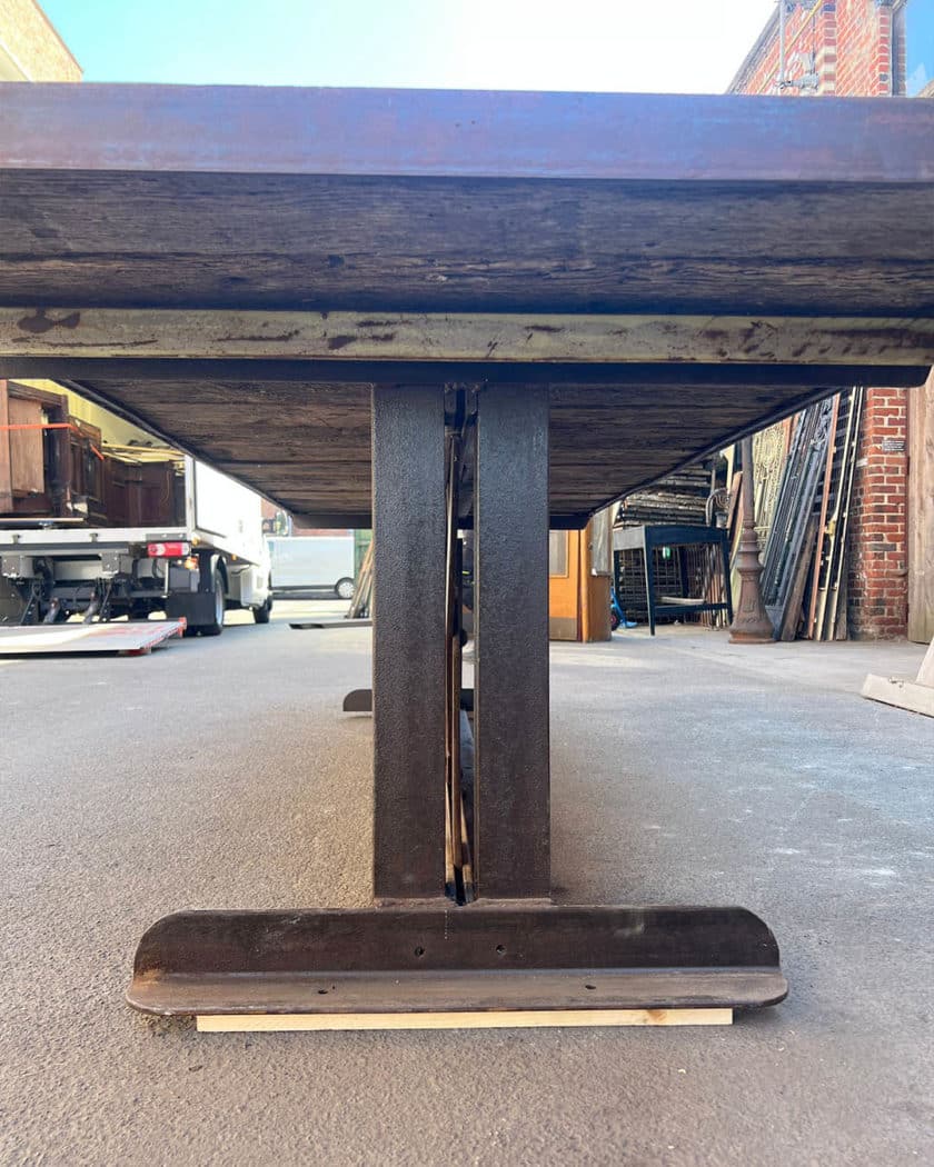Table with oak top and cast-iron base