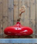 Paire de vases en céramique laquée rouge