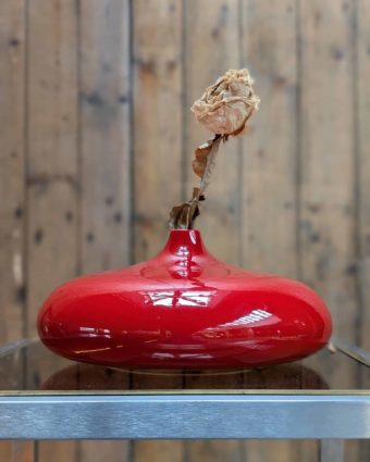 Pair of red lacquered ceramic vases