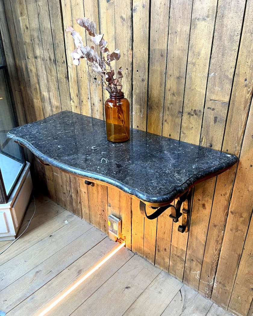 Pair of console tables in iron and black side marble
