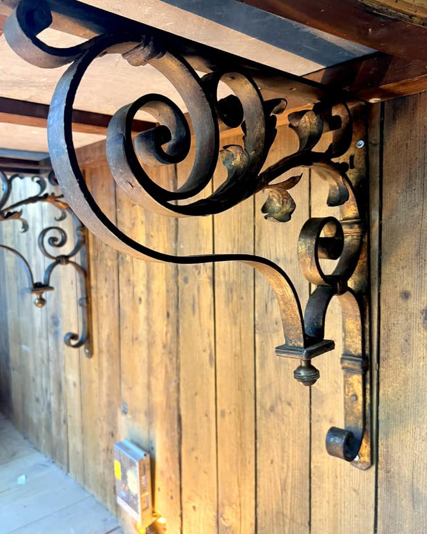 Pair of console tables in iron and black marble details