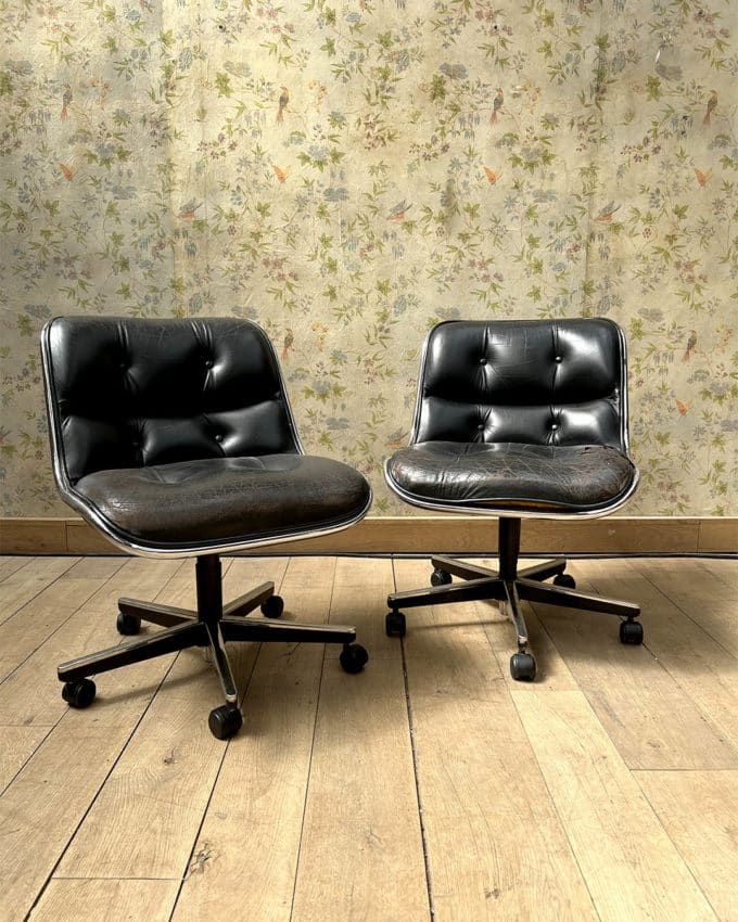 Pair of Charles POLLOCK swivel chairs