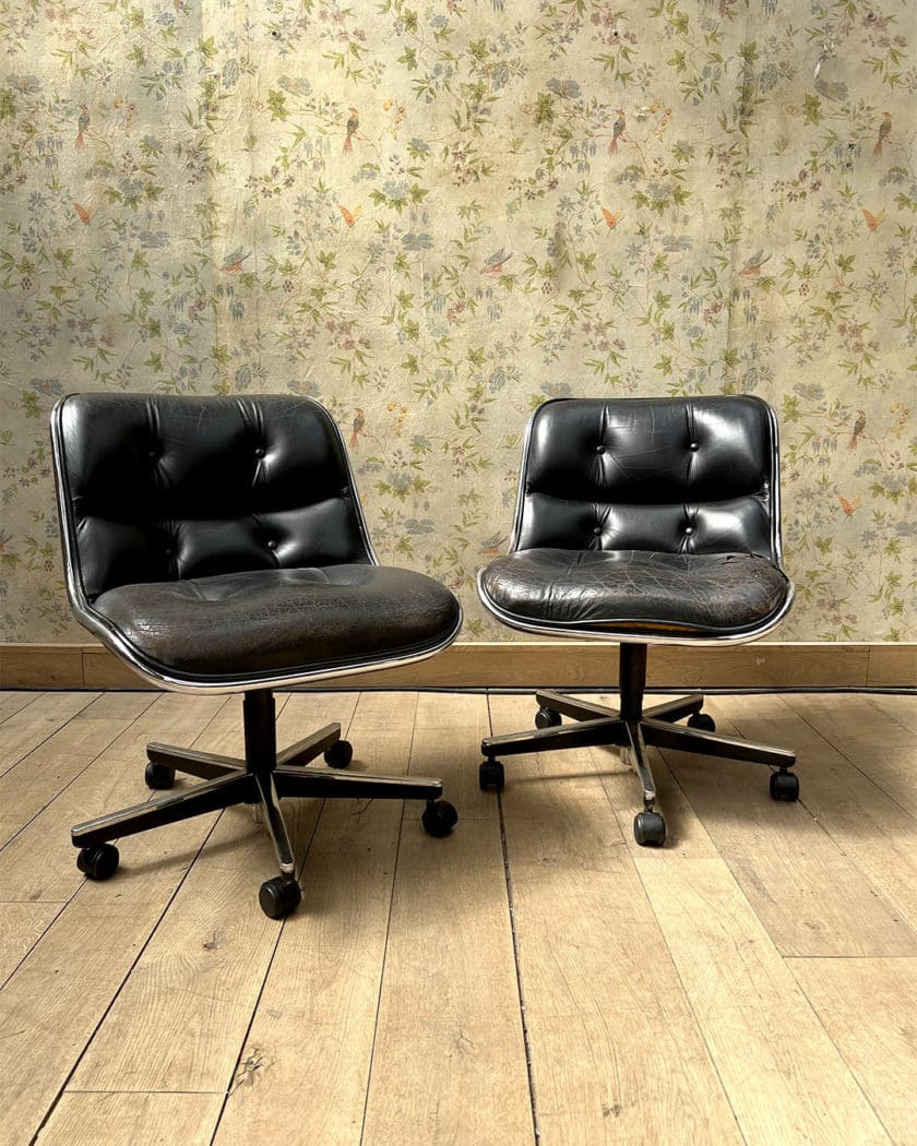 Pair of Charles POLLOCK swivel chairs