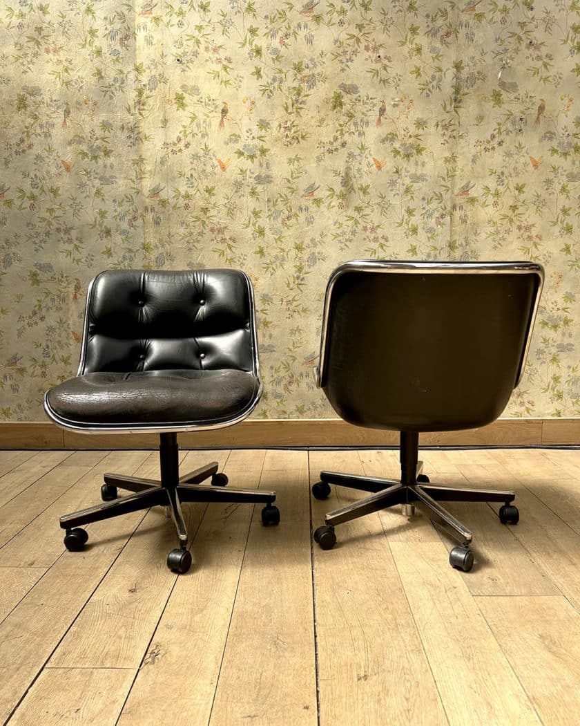 Pair of Charles POLLOCK swivel chairs