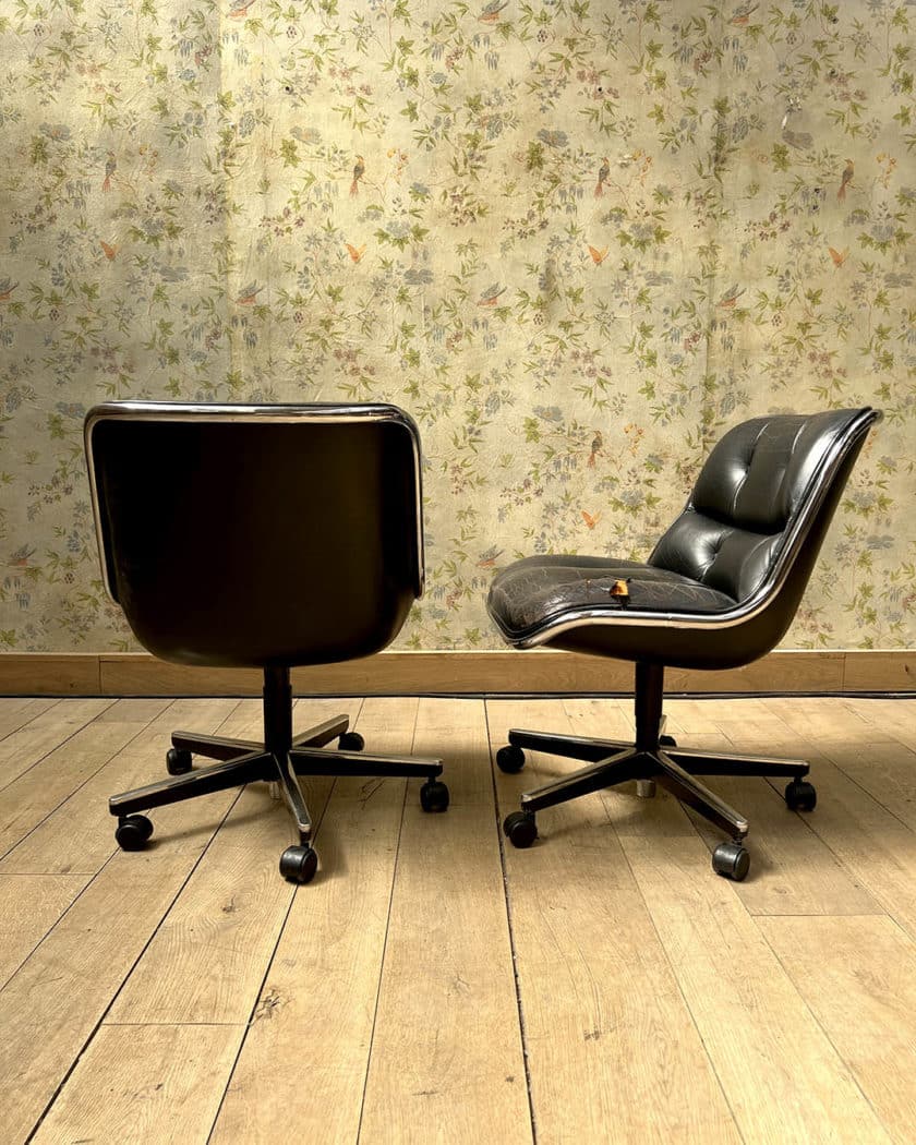 Pair of Charles POLLOCK swivel chairs