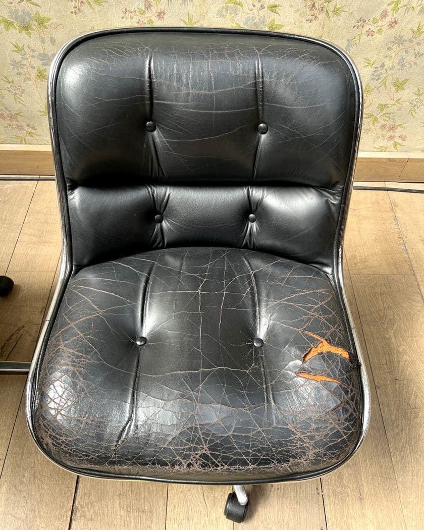 Pair of Charles POLLOCK swivel chairs