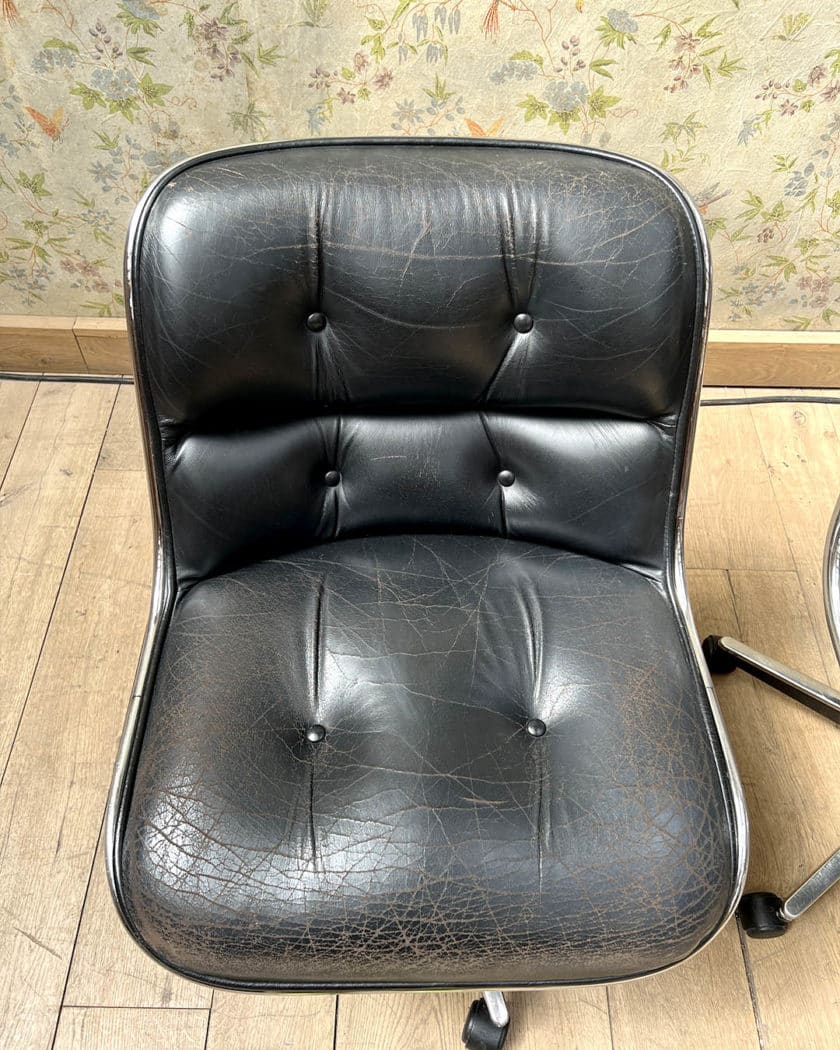 Pair of Charles POLLOCK swivel chairs