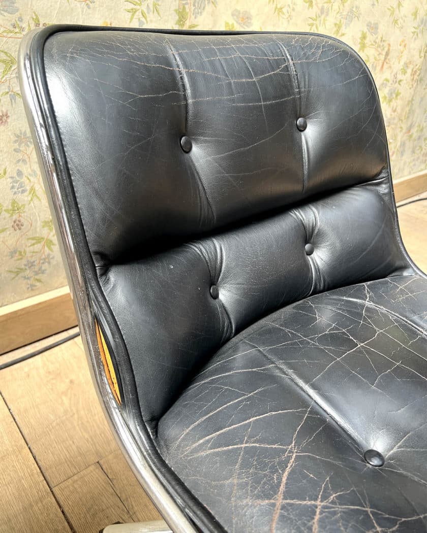 Pair of Charles POLLOCK swivel chairs