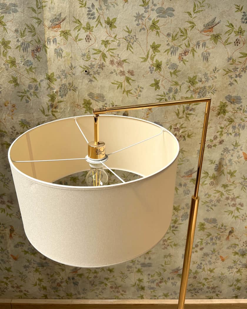Halogen floor lamp in gold-plated metal