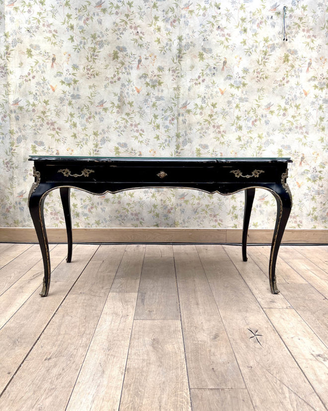 Blackened and gilded wood, flat desk with movement shape