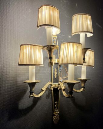 Pair of five-arm sconces in patinated bronze and gilt bronze