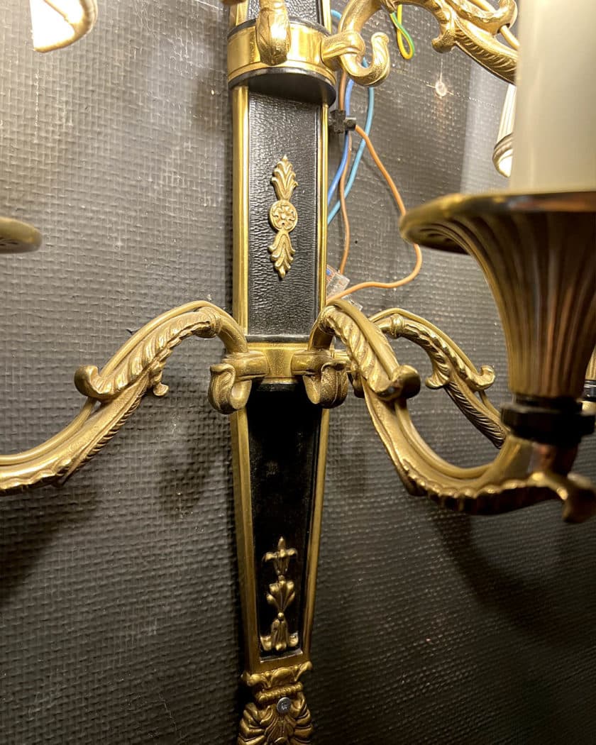 Paire d'appliques en bronze patiné et bronze doré à cinq bras