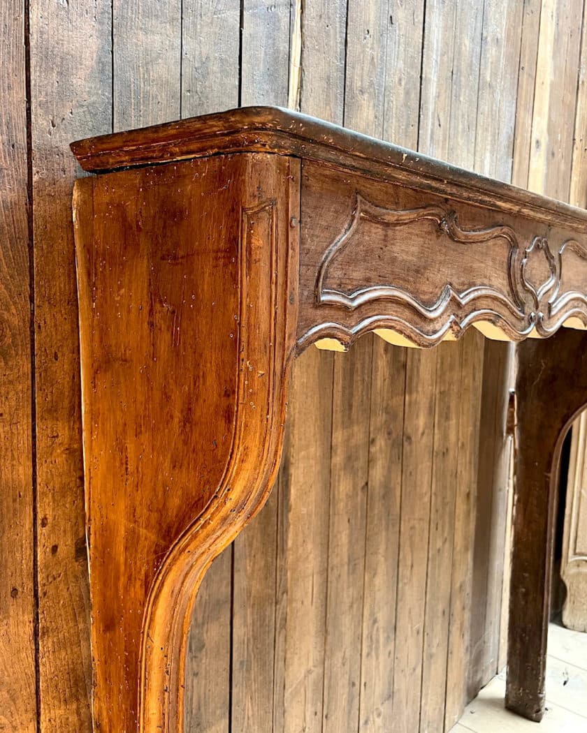 Louis XV style oak mantel side