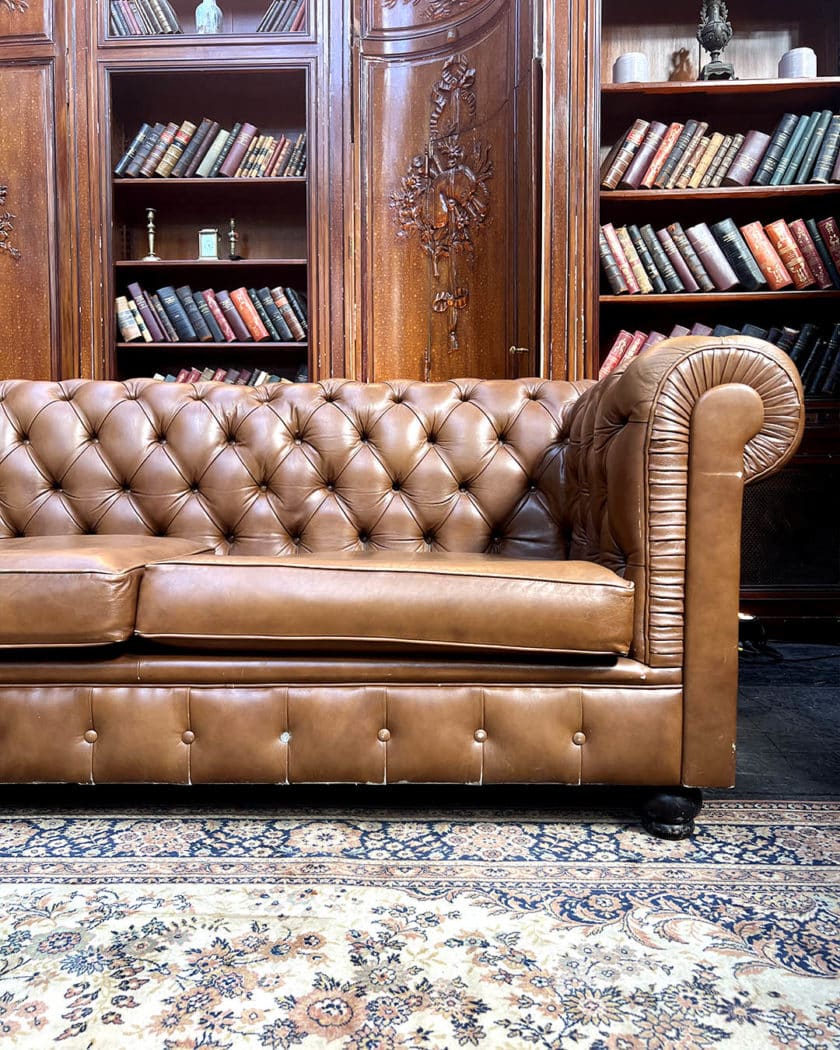 Upholstered leather chesterfield sofa