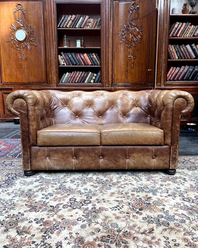 Chesterfield 2-seater sofa in upholstered leather