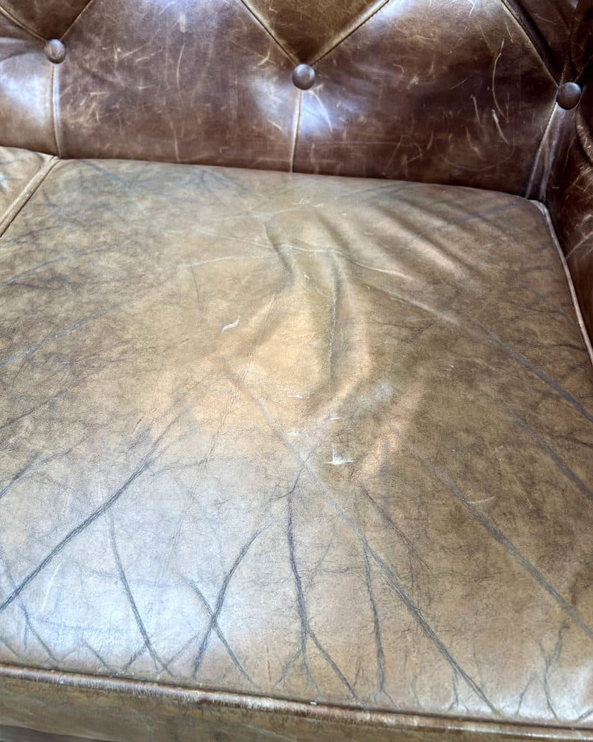 Chesterfield 2-seater sofa in upholstered leather