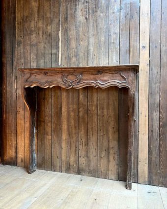 Louis XV style oak mantel